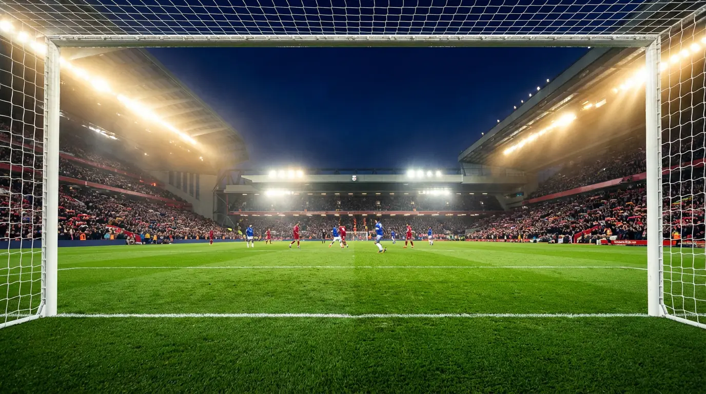 Stadio di calcio della Premier League durante una partita serale sotto i riflettori